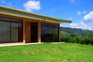 Large windows provide a great view of the Arenal region, including the volcano.